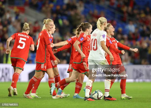 Jess Fishlock of Wales celebrates with her teammates after scoring their team's first goal during the UEFA Women's Nations League match between Wales...