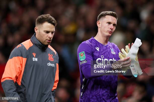Dean Henderson of Crystal Palace looks dejected as he leaves the field after sustaining an injury during the Carabao Cup Third Round match between...