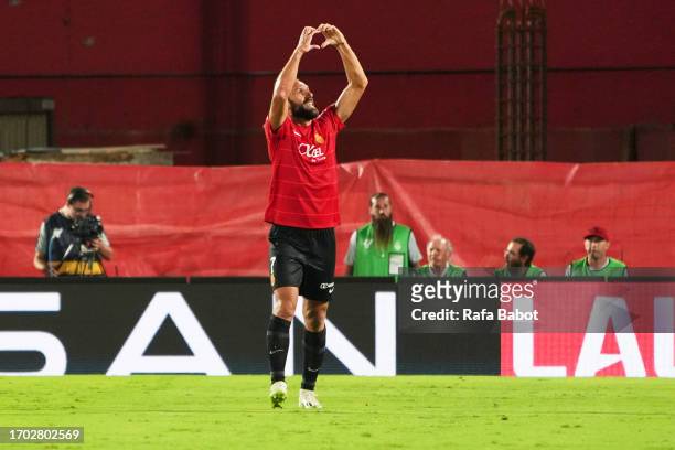 Vedat Muriqi of RCD Mallorca celebrates scoring his team´s first goal during the LaLiga EA Sports match between RCD Mallorca and FC Barcelona at...