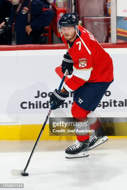 Dmitry Kulikov of the Florida Panthers skates with the puck prior to a preseason game against the Nashville Predators at the Amerant Bank Arena on...