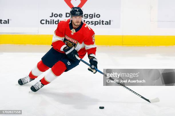 Dmitry Kulikov of the Florida Panthers skates with the puck prior to a preseason game against the Nashville Predators at the Amerant Bank Arena on...