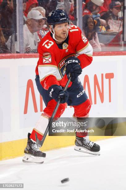 Sam Reinhart of the Florida Panthers passes the puck against the Nashville Predators during a preseason game at the Amerant Bank Arena on September...
