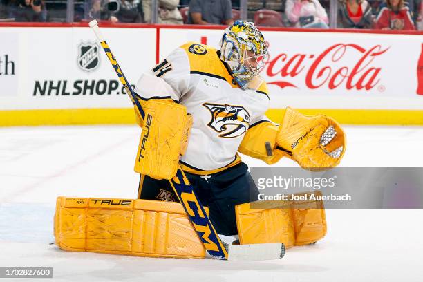 Goaltender Juuse Saros of the Nashville Predators defends the net against the Florida Panthers during a preseason game at the Amerant Bank Arena on...