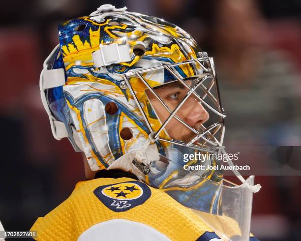 Goaltender Juuse Saros of the Nashville Predators xlooks up ice at the start of the first period against the Florida Panthers during a preseason game...