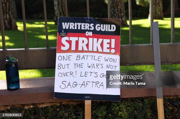 Support sign rests near SAG-AFTRA members picketing outside Warner Bros. Studio as the actors strike continues on September 26, 2023 in Burbank,...