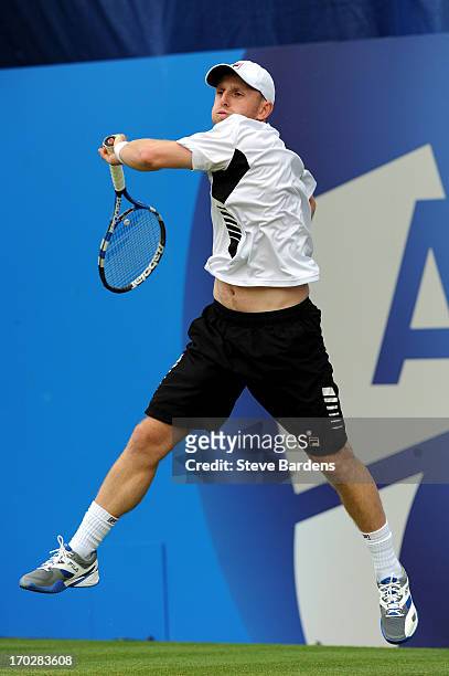 Jesse Levine of Canada hits a forehand shot during his Men's Singles first round match against Santiago Giraldo of Colombia on day one of the AEGON...