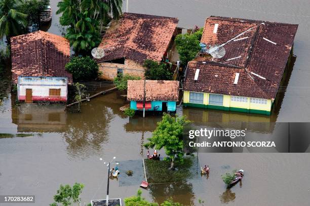 The streets of the eight-thousand-inhabitants town Presidente Jucelino, 120Km from Sao Luis, remain covered by the waters of the flooded Preto river,...