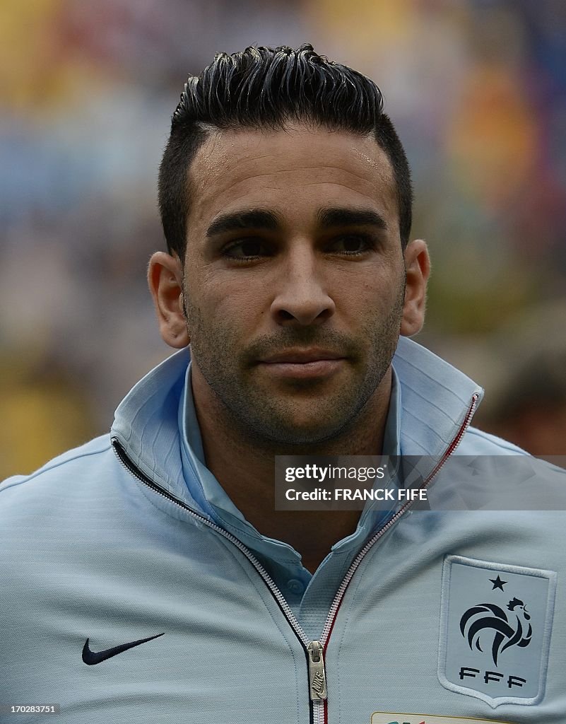Adil Rami Fra France's defender Adil Rami poses before the friendly football match ...