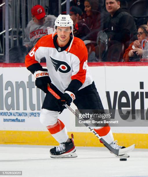 Morgan Frost of Philadelphia Flyers skates against the New Jersey Devils at a preseason game at the Prudential Center on September 25, 2023 in...