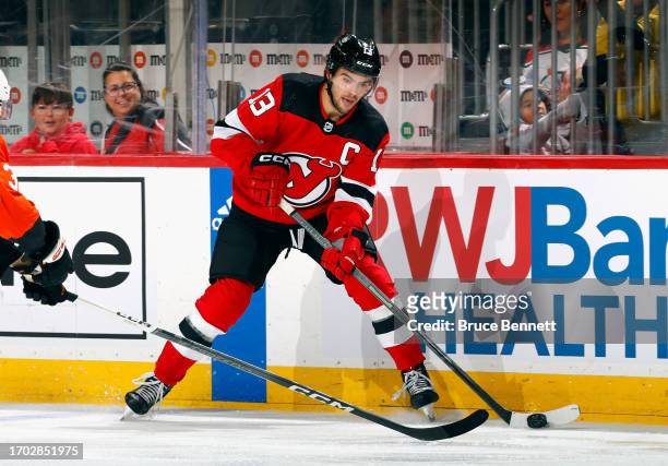 Nico Hischier of New Jersey Devils skates against the Philadelphia Flyers at a preseason game at the Prudential Center on September 25, 2023 in...