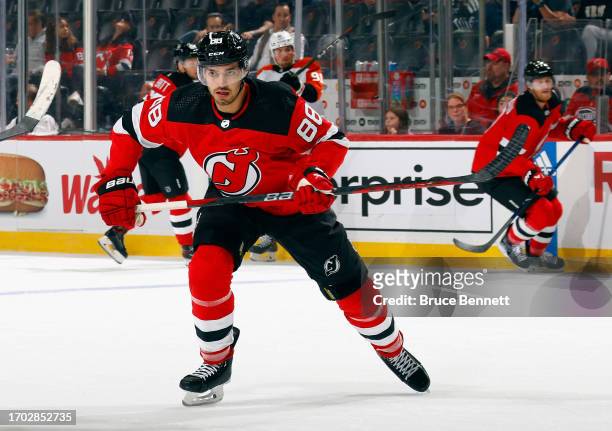 Kevin Bahl of New Jersey Devils skates against the Philadelphia Flyers at a preseason game at the Prudential Center on September 25, 2023 in Newark,...