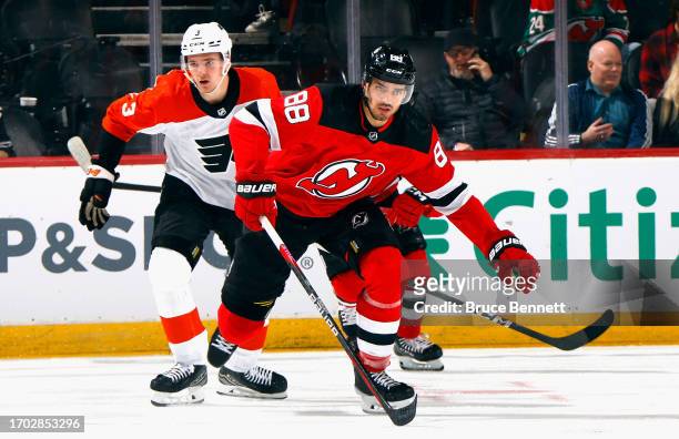 Kevin Bahl of New Jersey Devils skates against the Philadelphia Flyers at a preseason game at the Prudential Center on September 25, 2023 in Newark,...