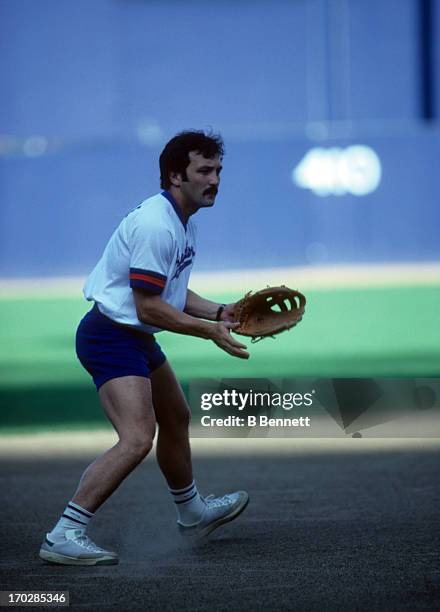 Bryan Trottier of the New York Islanders plays the infield during a charity softball match at Shea Stadium, Flushing, Queens, New York, September,...
