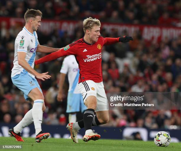 Rasmus Hojlund of Manchester United in action with Rob Holding of Crystal Palace during the Carabao Cup Third Round match between Manchester United...