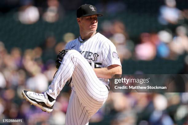 Starting pitcher Chase Anderson of the Colorado Rockies throws against the Los Angeles Dodgers in the second inning during Game One of a Doubleheader...