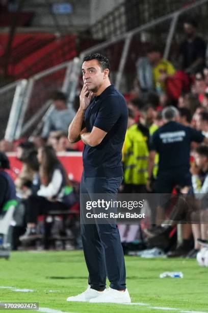 Xavi Hernandez, head coach of FC Barcelona looks on during the LaLiga EA Sports match between RCD Mallorca and FC Barcelona at Estadi de Son Moix on...
