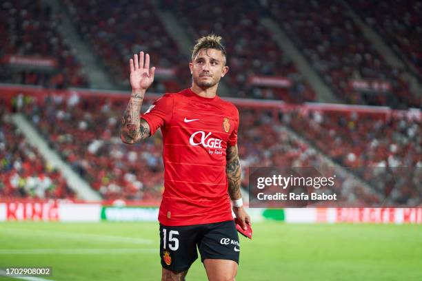 Pablo Maffeo of RCD Mallorca leaves the pitch injure during the LaLiga EA Sports match between RCD Mallorca and FC Barcelona at Estadi de Son Moix on...