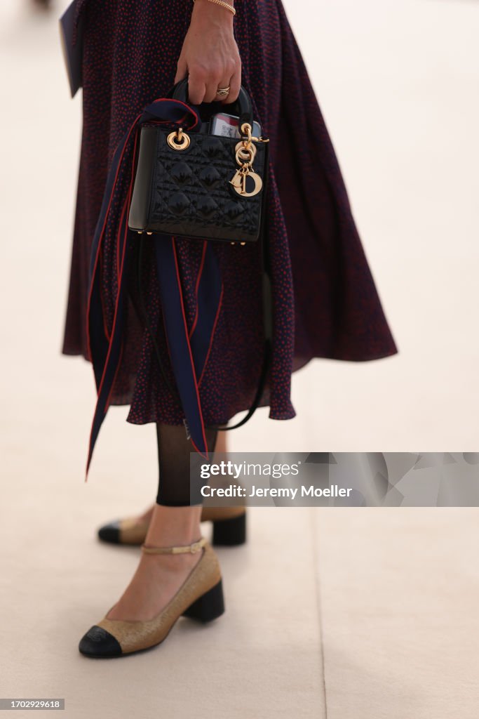 Street Style - Paris Fashion Week - Womenswear Spring/Summer 2024 - Day Two