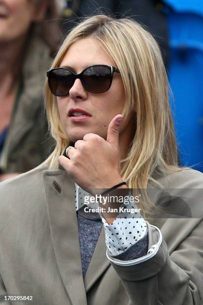 Maria Sharapova as she watches her boyfriend, Grigor Dimitov of Bulgaria during his Men's Singles first round match against Dudi Sela of Israel on...