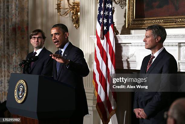 President Barack Obama speaks as chairman of the Council of Economic Advisers Alan Krueger and economist Jason Furman listen during a personnel...