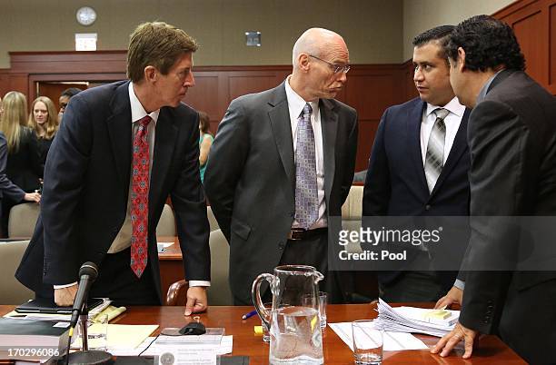 George Zimmerman and his attorneys discuss jury questionnaires with defense attorney Mark O'Mara co-counsel Don West , and jury consultant Robert...