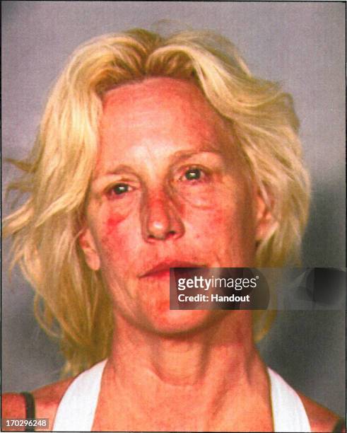 In this handout photo provided by Nevada Department of Wildlife, Erin Brockovich-Ellis is seen in a police booking photo after her arrest on charges...
