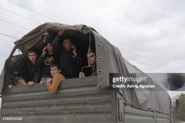 Armenians from Nagorno-Karabakh are evacuated on September 26, 2023 in Kornidzor, Armenia. Some 30,000 Armenians have fled Nagorno-Karabakh in the...