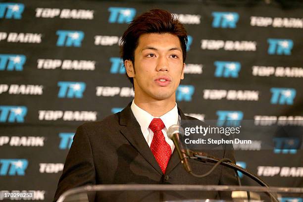 Ryota Murata speaks at a press conference announcing his signing with Top Rank Boxing as he starts his professional career at Beverly Hills Hotel on...