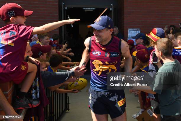 Lachie Neale interacts with fans during a Brisbane Lions AFL training session at Brighton Homes Arena on September 26, 2023 in Ipswich, Australia.