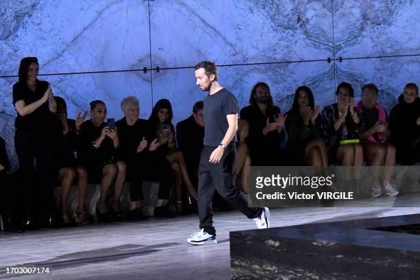 Fashion designer Anthony Vaccarello walks the runway during the Saint Laurent Ready to Wear Spring/Summer 2024 fashion show as part of the Paris...