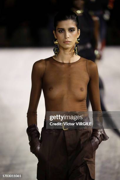 Mica Arganaraz walks the runway during the Saint Laurent Ready to Wear Spring/Summer 2024 fashion show as part of the Paris Fashion Week on September...