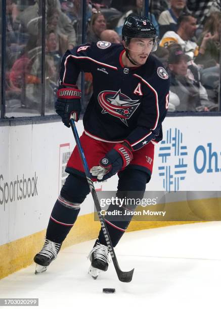 Zach Werenski of the Columbus Blue Jackets skates with the puck during the first period against the Pittsburgh Penguins at Nationwide Arena on...