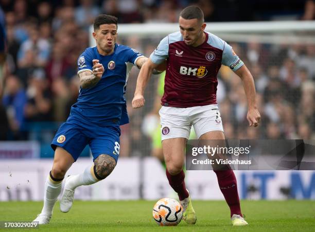 Enzo Fernández of Chelsea and John McGinn of Aston Villa during the Premier League match between Chelsea FC and Aston Villa at Stamford Bridge on...