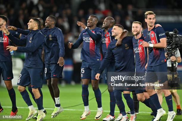 Paris Saint Germain squad celebrates after winning Olympique de Marseille during the Ligue 1 Uber Eats match between Paris Saint-Germain and...