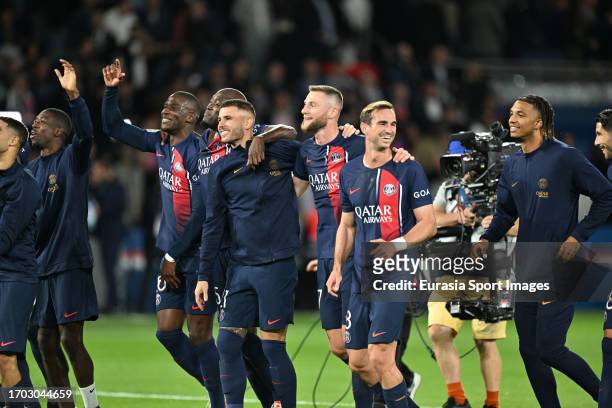 Paris Saint Germain squad celebrates after winning Olympique de Marseille during the Ligue 1 Uber Eats match between Paris Saint-Germain and...