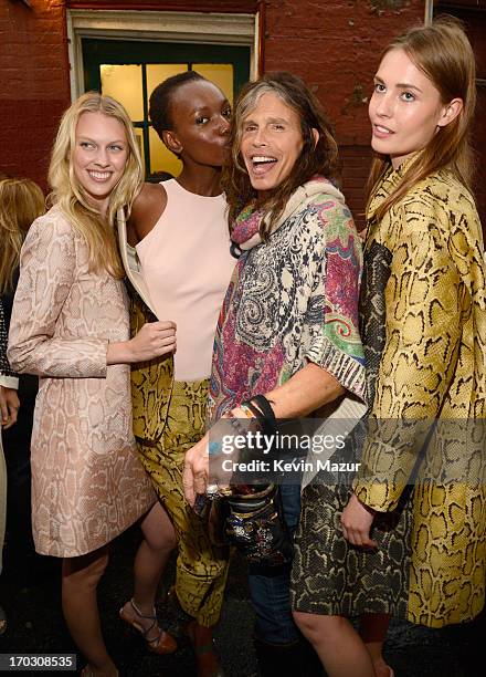 Steven Tyler and models attend the Stella McCartney Spring 2014 Collection Presentation at West 10th Street on June 10, 2013 in New York City.