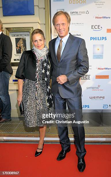 Gerhard Delling and Isabelle Delling attend charity event "Das kleine Herz im Zentrum" at St. Pauli Theater on June 10, 2013 in Hamburg, Germany.