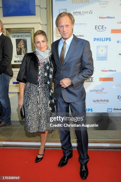 Gerhard Delling and Isabelle Delling attend charity event "Das kleine Herz im Zentrum" at St. Pauli Theater on June 10, 2013 in Hamburg, Germany.