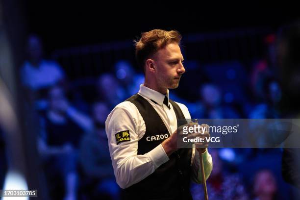 Judd Trump of England chalks the cue in the second round match against Hammad Miah of England on day two of the 2023 Cazoo British Open at the...