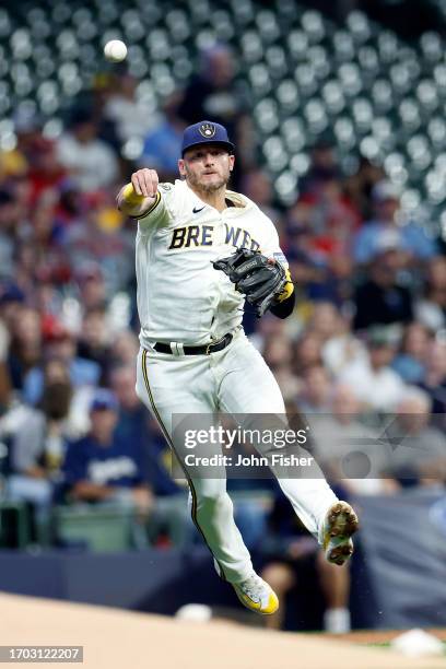 Josh Donaldson of the Milwaukee Brewers throws out a batter in the first inning against the St. Louis Cardinals at American Family Field on September...