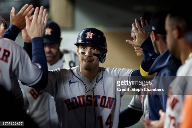 Houston Astros second baseman Mauricio Dubon celebrates a run during the second inning against the Seattle Mariners at T-Mobile Park on September 25,...
