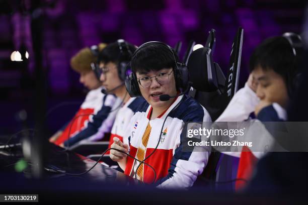 Kawee Wachiraphas of Team of Thailand celebrate with teammate after win the Arena of Valor Asian Games Version Bronze Medal Match against team Viet...