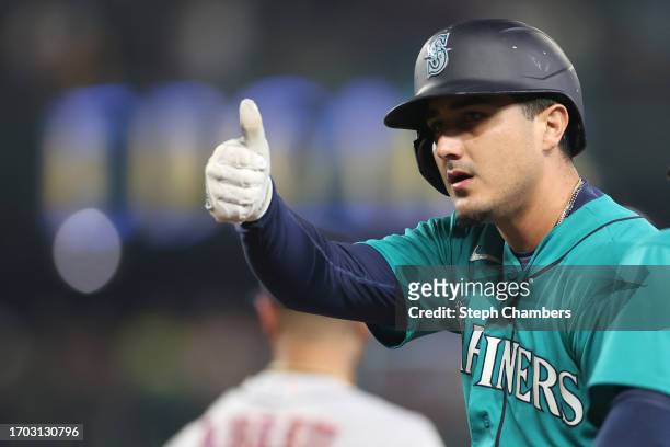 Josh Rojas of the Seattle Mariners singles against the Houston Astros at T-Mobile Park on September 25, 2023 in Seattle, Washington.