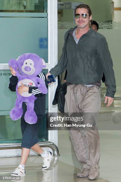 Actor Brad Pitt and Pax Thien Jolie-Pitt are seen upon arrival at Gimpo Airport on June 11, 2013 in Seoul, South Korea. Brad Pitt is visiting South...