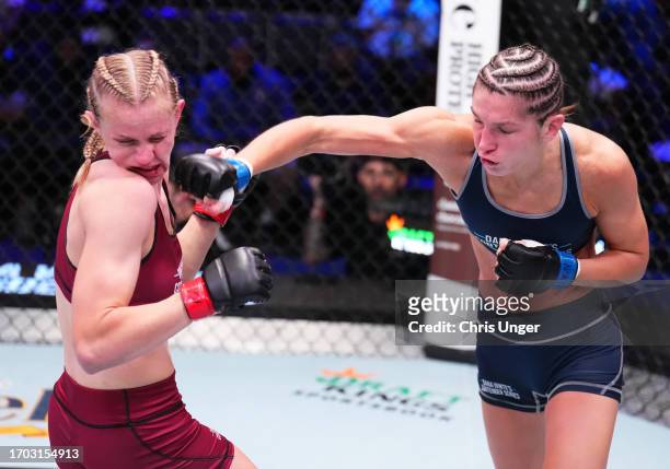 Ernesta Kareckaite of Lithuania punches Carli Judice in a flyweight fight during Dana White's Contender Series season seven, week eight at UFC APEX...