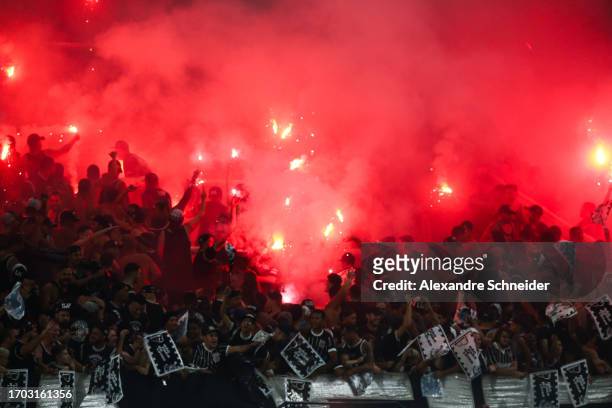 Fans of Corinthians cheer prior to the first leg of Copa CONMEBOL Sudamericana semifinal between Corinthians and Fortaleza at Neo Quimica Arena on...