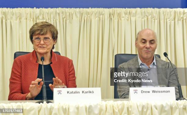 Hungary's Katalin Kariko and her American research partner Drew Weissman attend a press conference at the University of Pennsylvania in Philadelphia,...