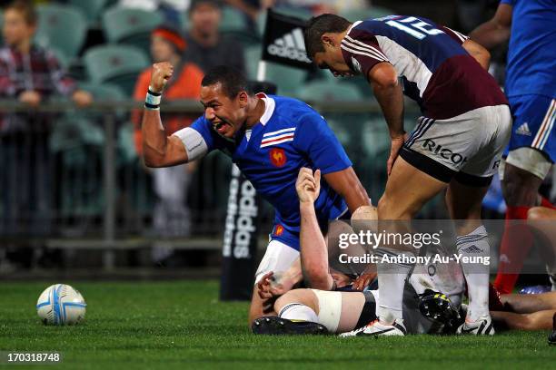 Gael Fickou of France celebrates his try during the tour match between the Auckland Blues and France at North Harbour Stadium on June 11, 2013 in...