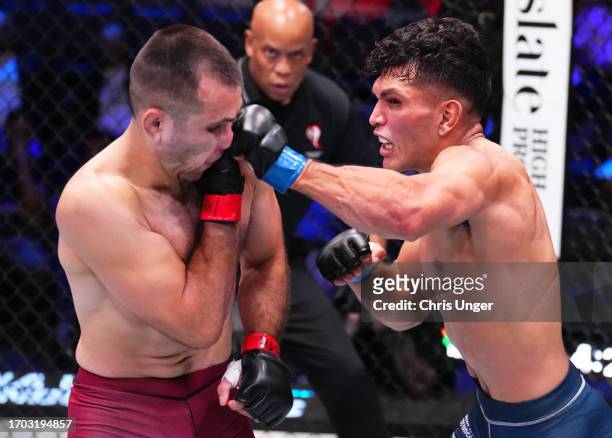 Danny Silva punches Angel Pacheco in a featherweight fight during Dana White's Contender Series season seven, week eight at UFC APEX on September 26,...