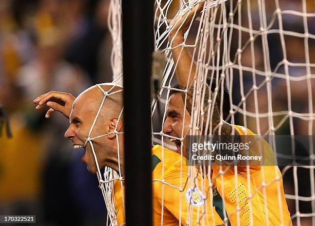 Mark Bresciano of Australia celebrates scoring a goal during the FIFA World Cup Qualifier match between the Australian Socceroos and Jordan at Etihad...